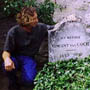 Jack Reilly at van Gogh's grave 1996